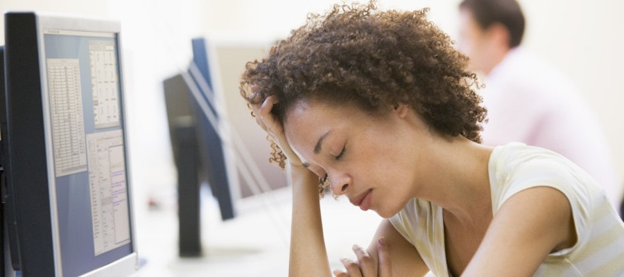 Woman inside computer room sleeping