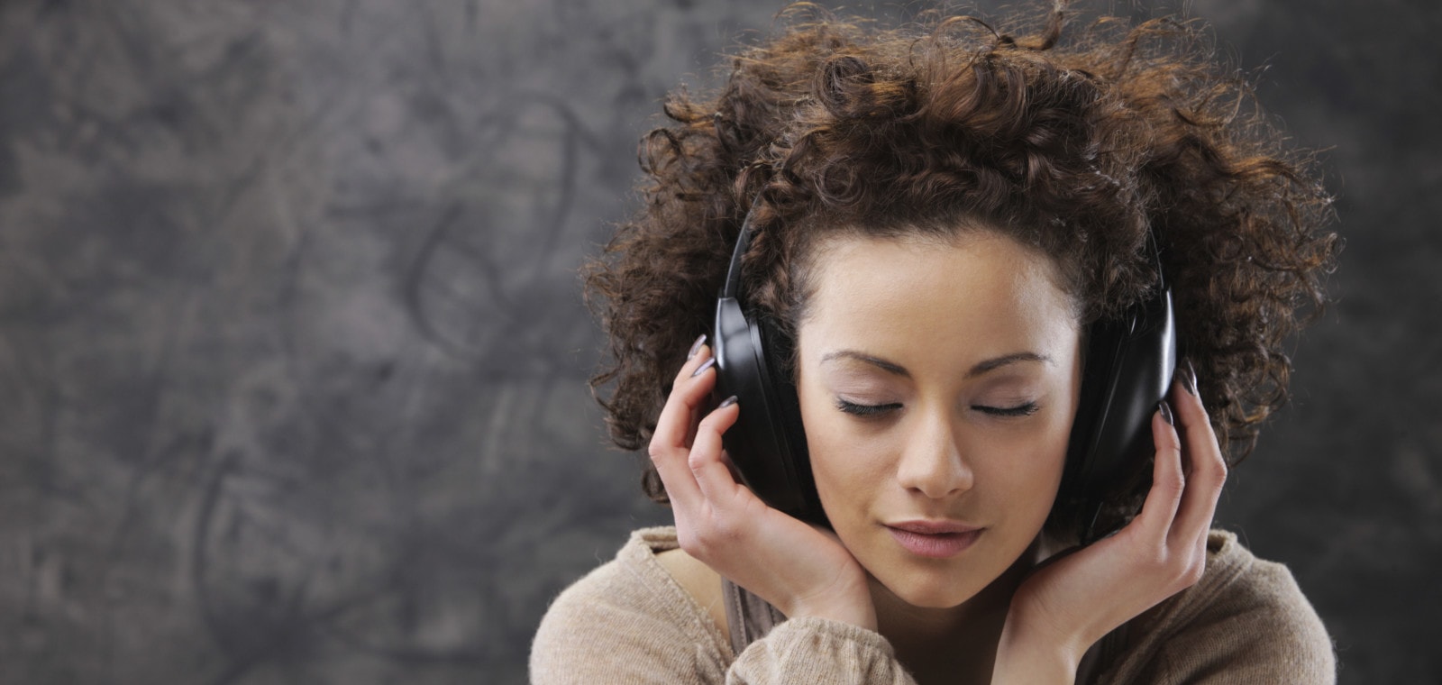 Young woman enjoying audio