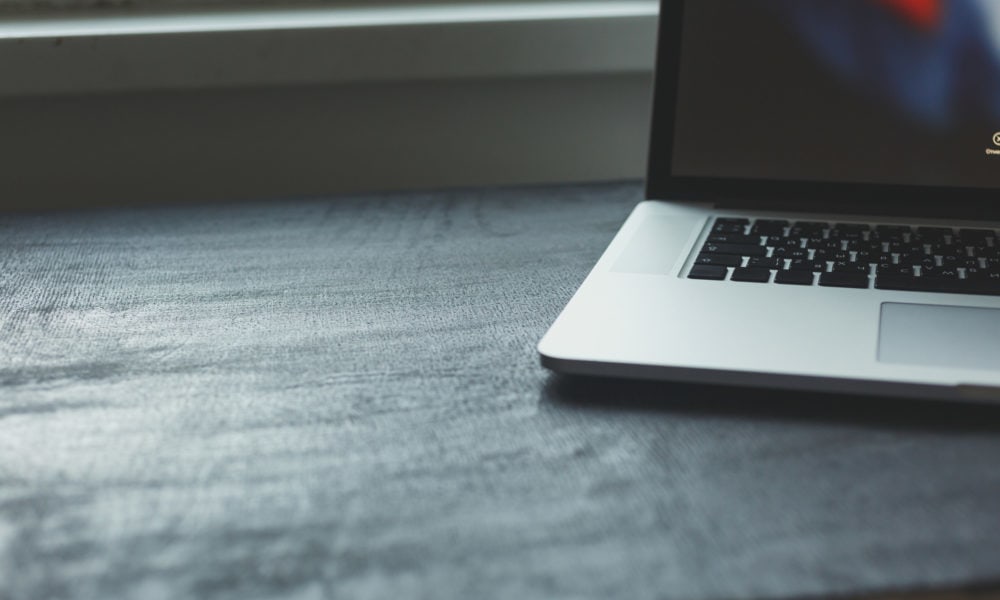 Laptop on modern wooden desk